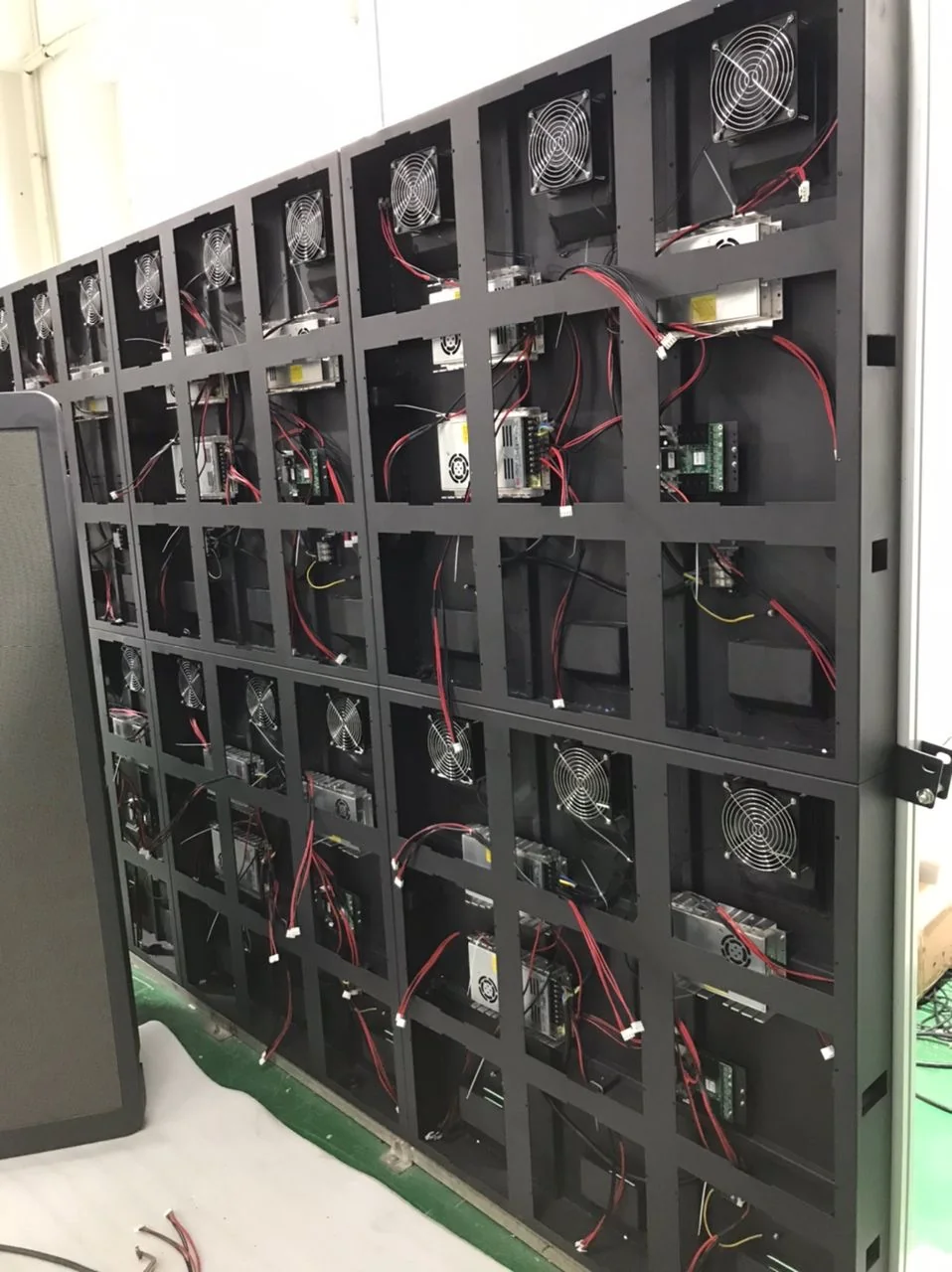 Inside a legacy LED sign — a PC fan in every single module bay