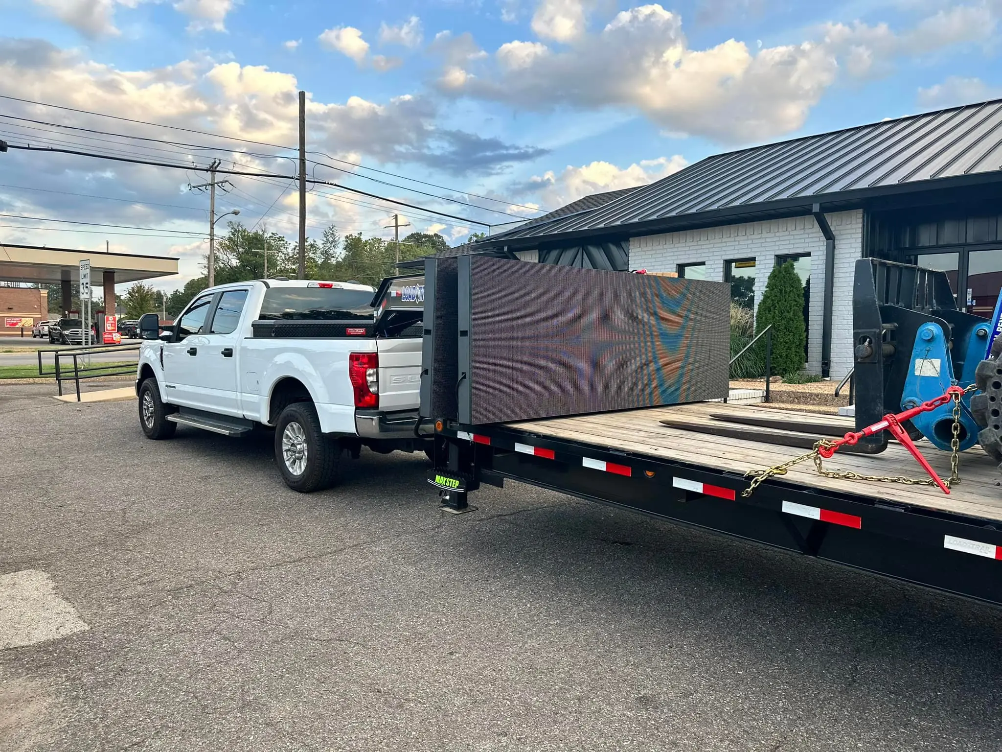 Legacy LED sign loaded on flatbed trailer for transport